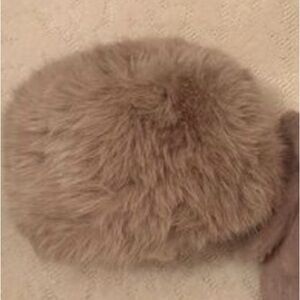 Fur tan hat very stylish and warm.